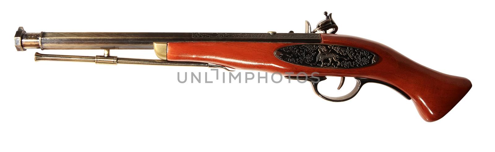 Model of the old gun on the white background, souvenir