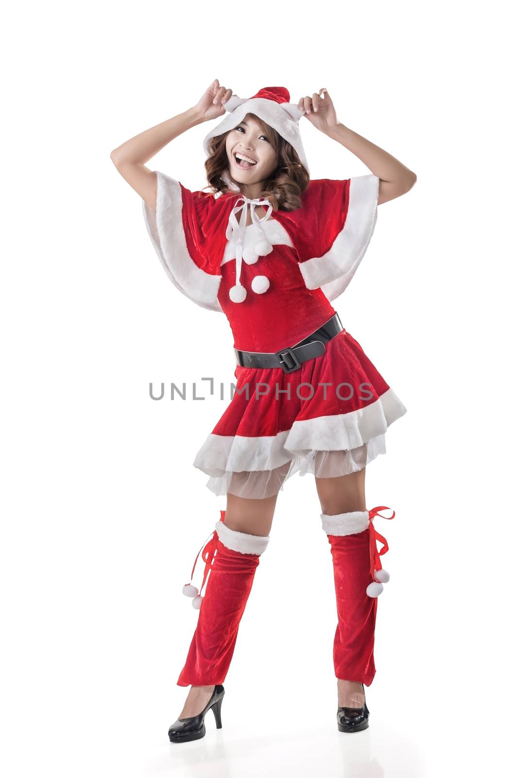 Attractive Christmas lady of Asian woman, full length portrait.