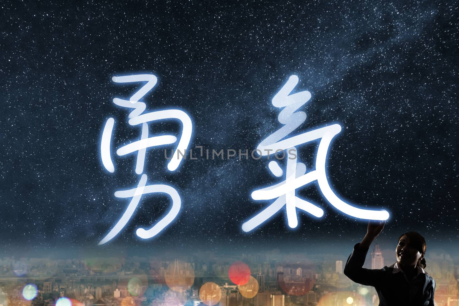 Concept of courage, silhouette asian business woman light drawing. The chinese words means "courage".