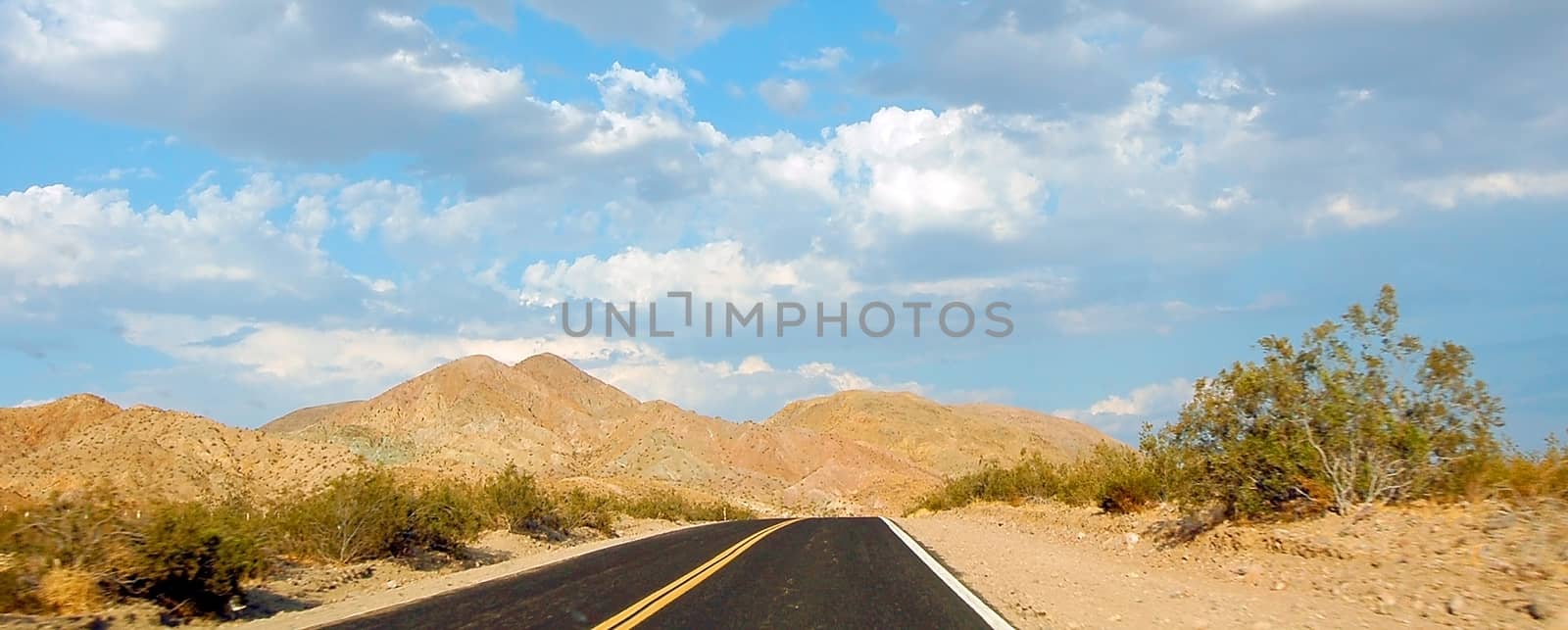 highway road in a dry desert landscape