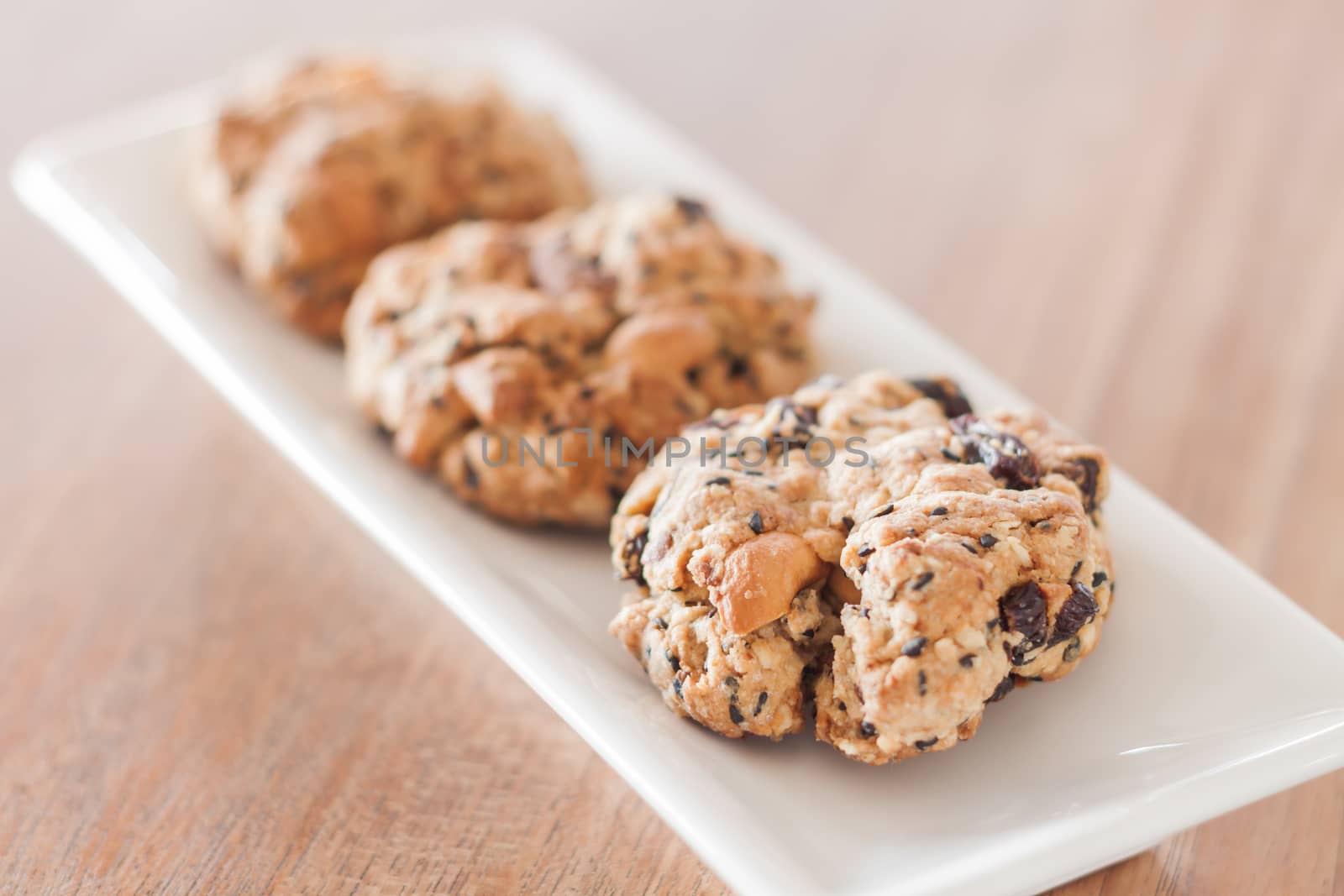 Healthy cookies on white plate by punsayaporn