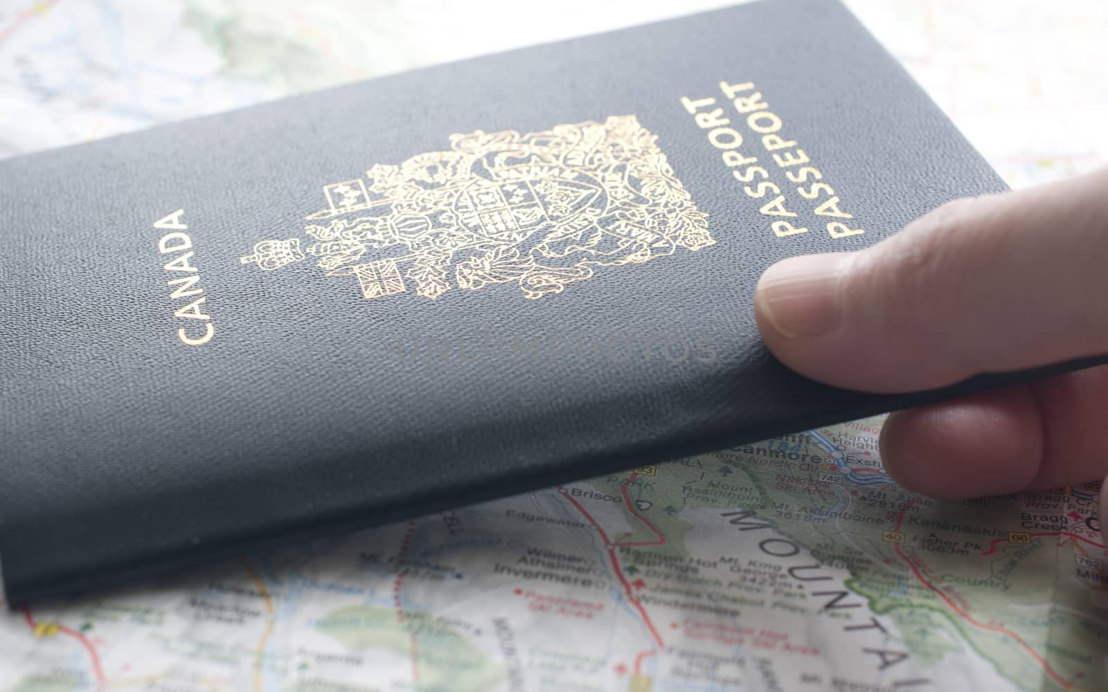 People carrying passport and map ready to travel.