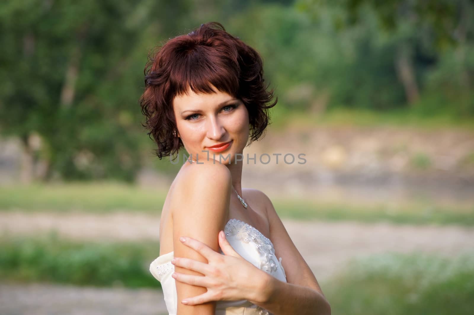 the lovely girl in a wedding dress by Viktoha