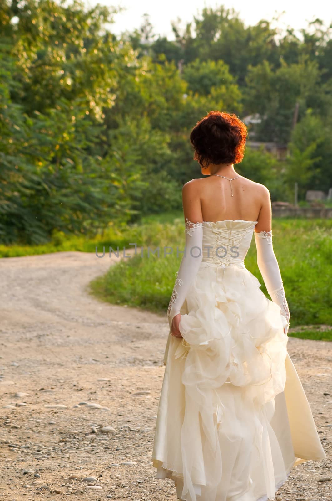 the lovely girl in a wedding dress by Viktoha