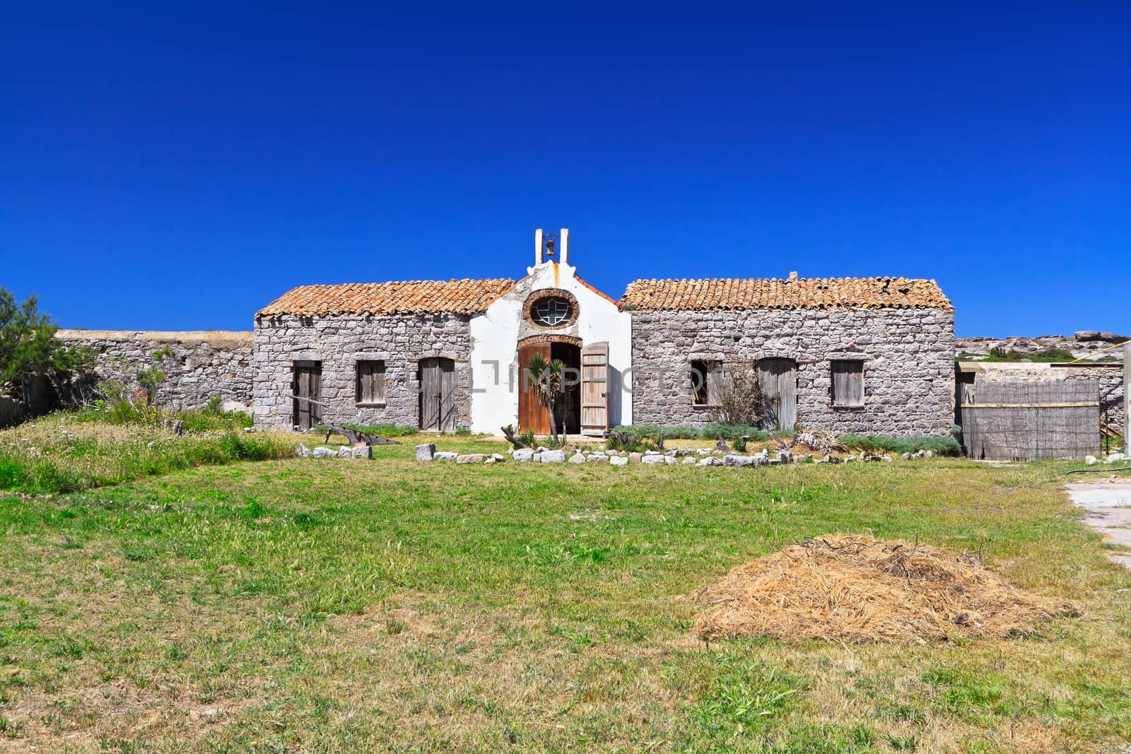 ancient small chapel in San Pietro island, Sardinia, Italy