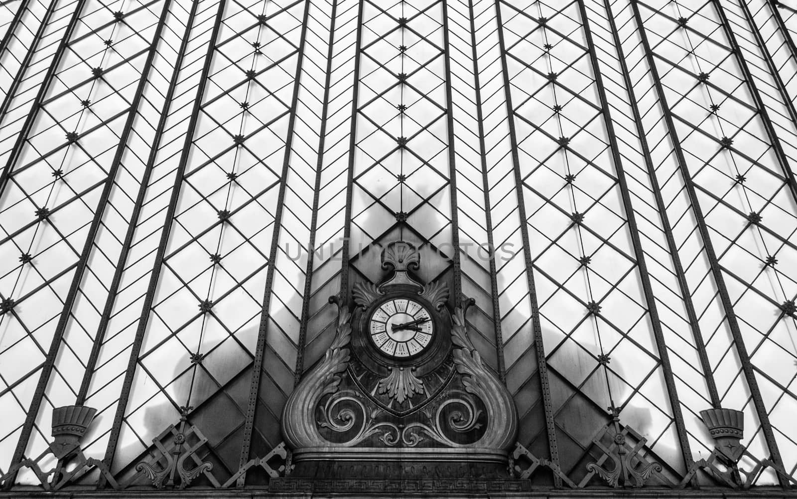 an old clock in the Atocha railways station in the heart of Madrid