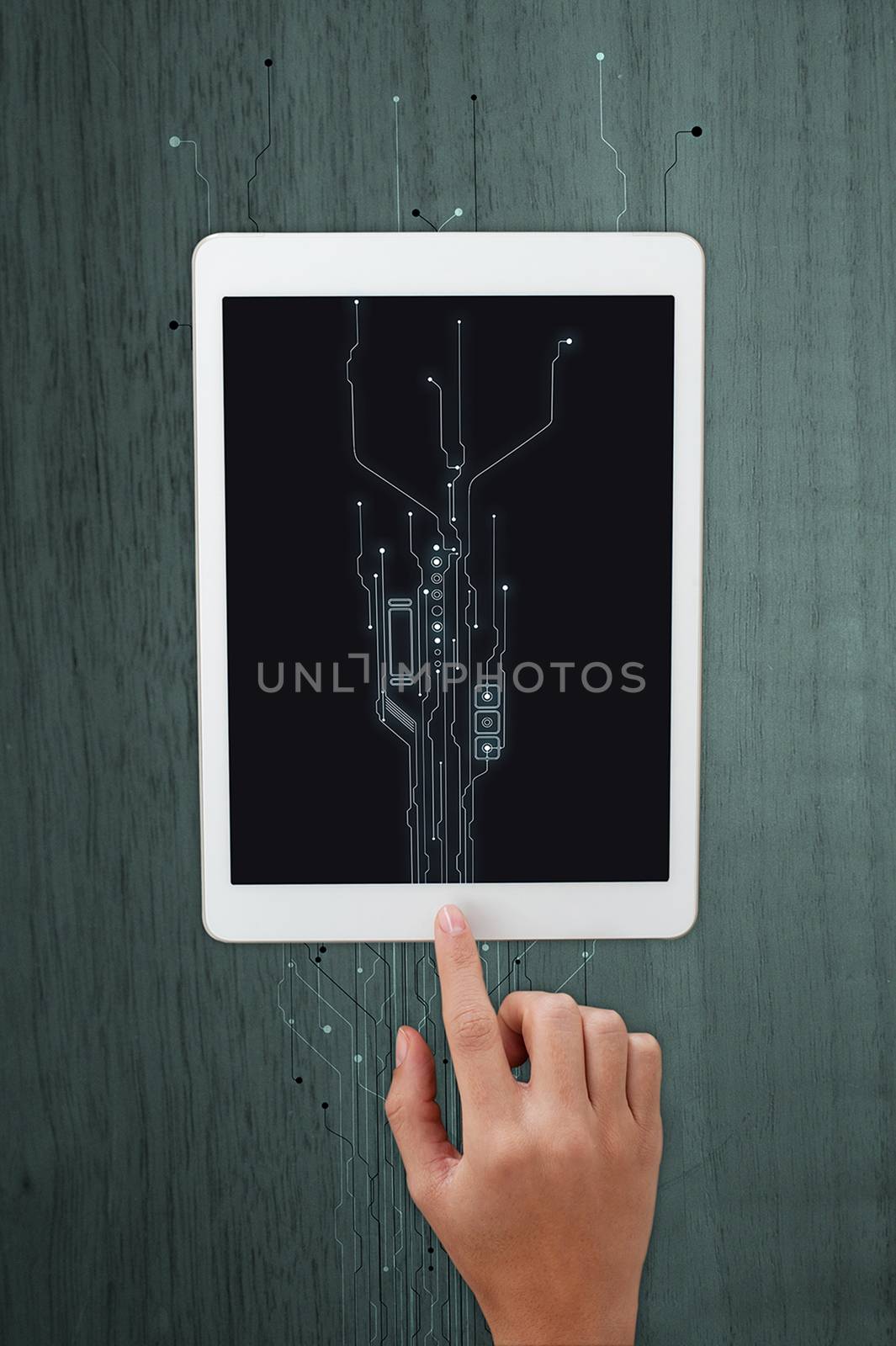 Finger touching the digital tablet pc by stockyimages