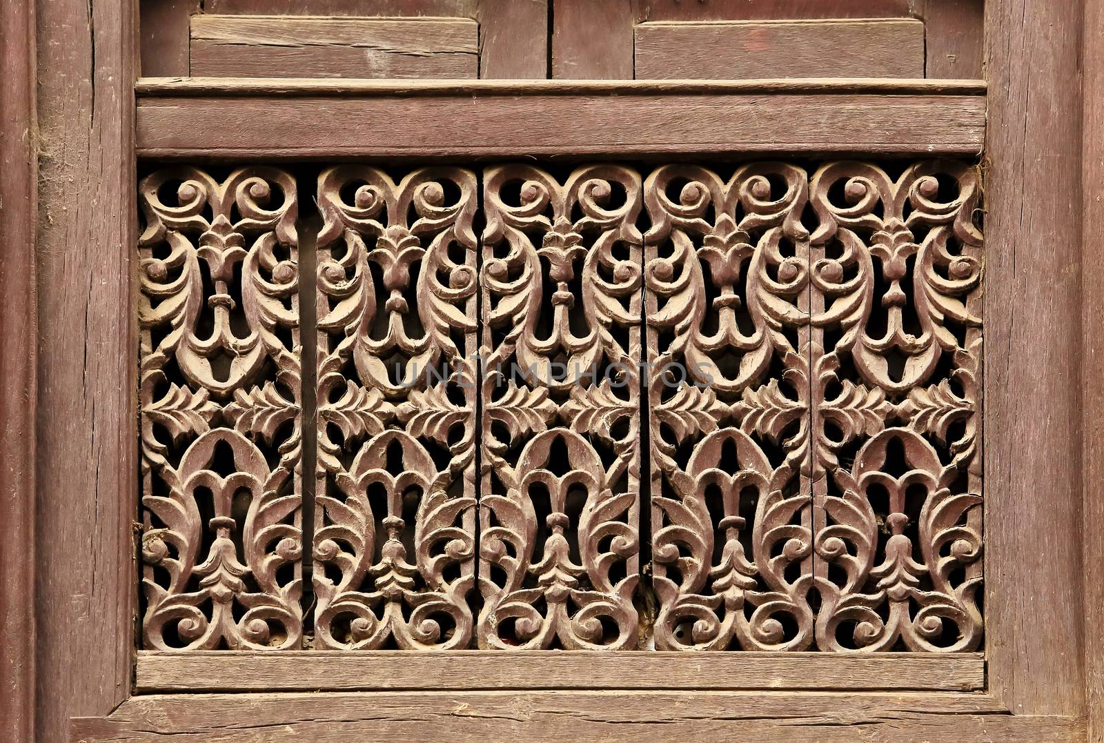 Old wooden traditional Nepalese window detail. Nepal.