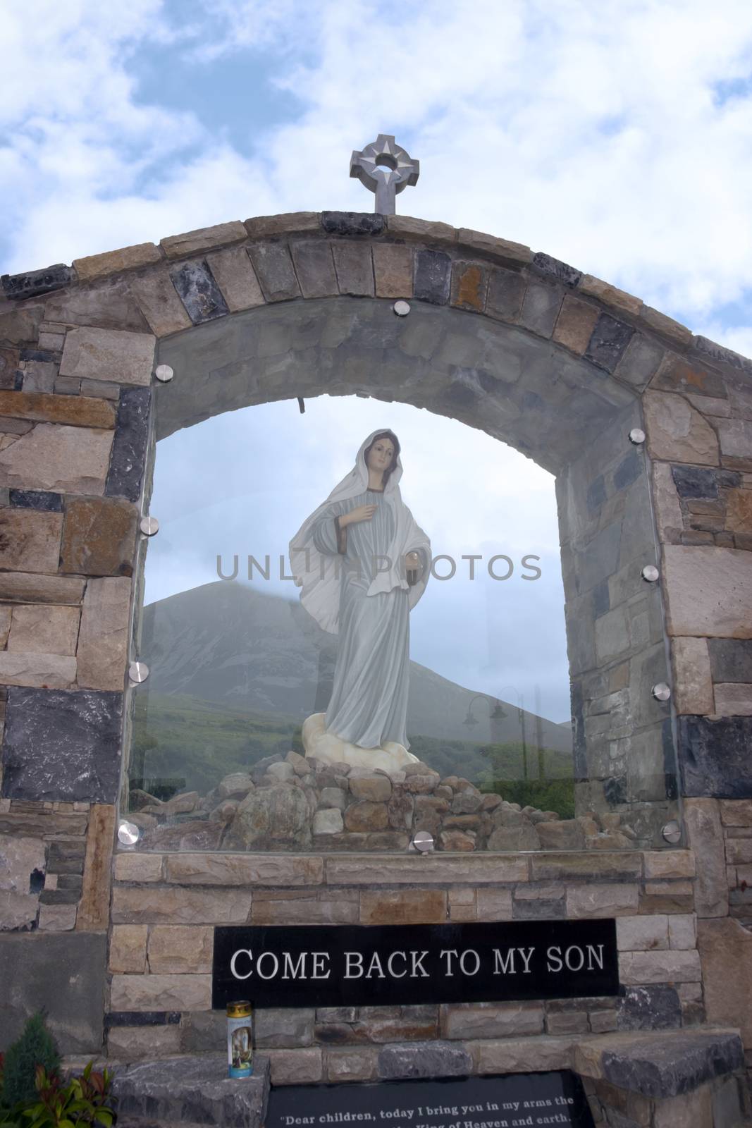 glass holy shrine with croagh patrick mountains in the background