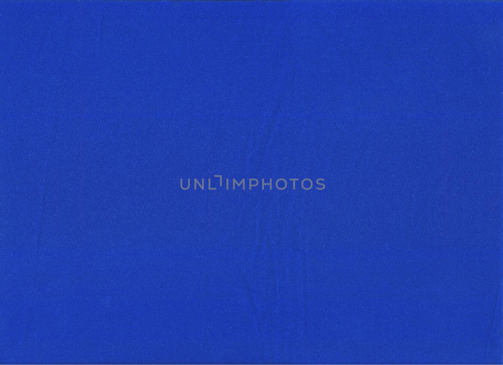 Texture of dark blue indigo satin fabric