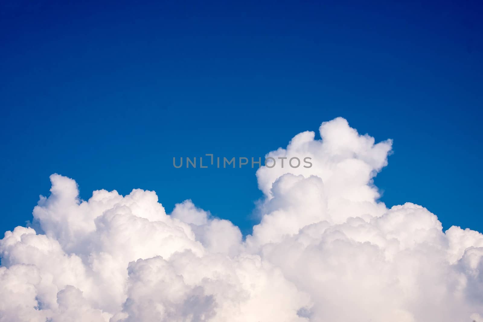 Cloudscape. Blue sky and white cloud. Sunny day. Cumulus cloud.