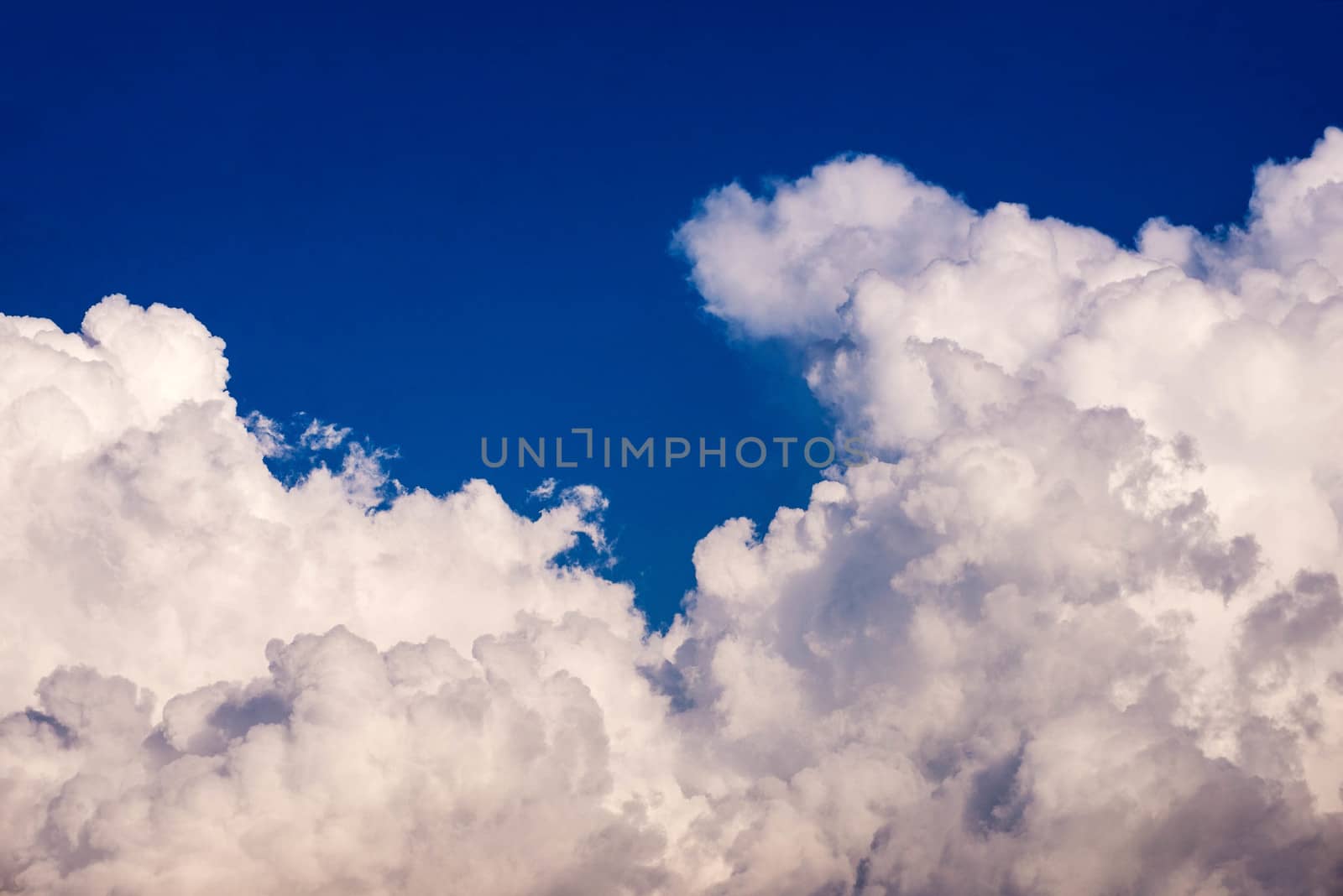 Cloudscape. Blue sky and white cloud. Sunny day. Cumulus cloud.