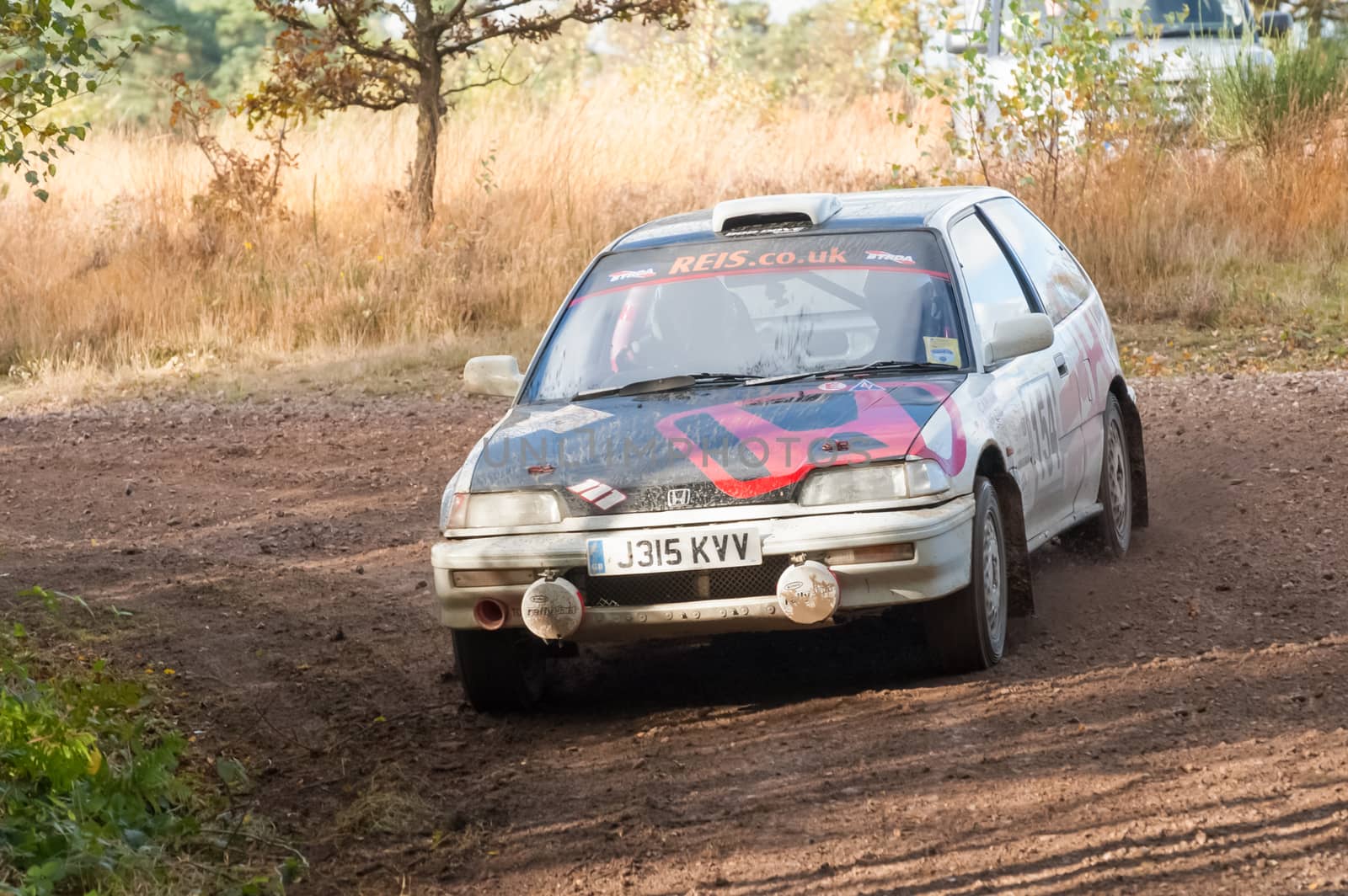 Aldershot, UK - November 3, 2012: Dave Colton drifting a Honda Civic sideways on the Pavillion stage of the MSA Tempest Rally near Aldershot, UK