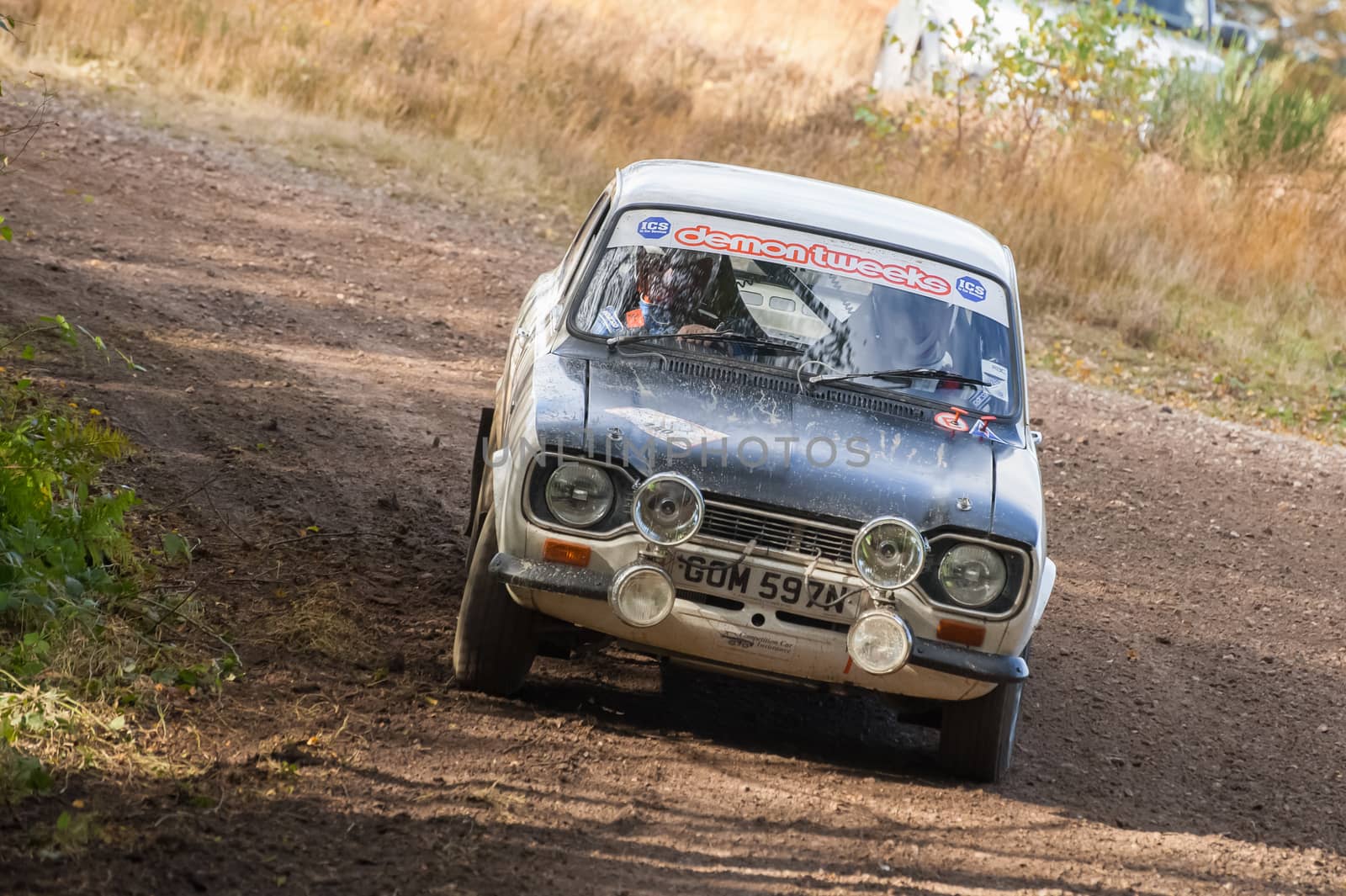 Aldershot, UK - November 3, 2012: Mike Hall driving a classic Ford Escort Mexico on the Pavillion stage of the MSA Tempest Rally near Aldershot, UK