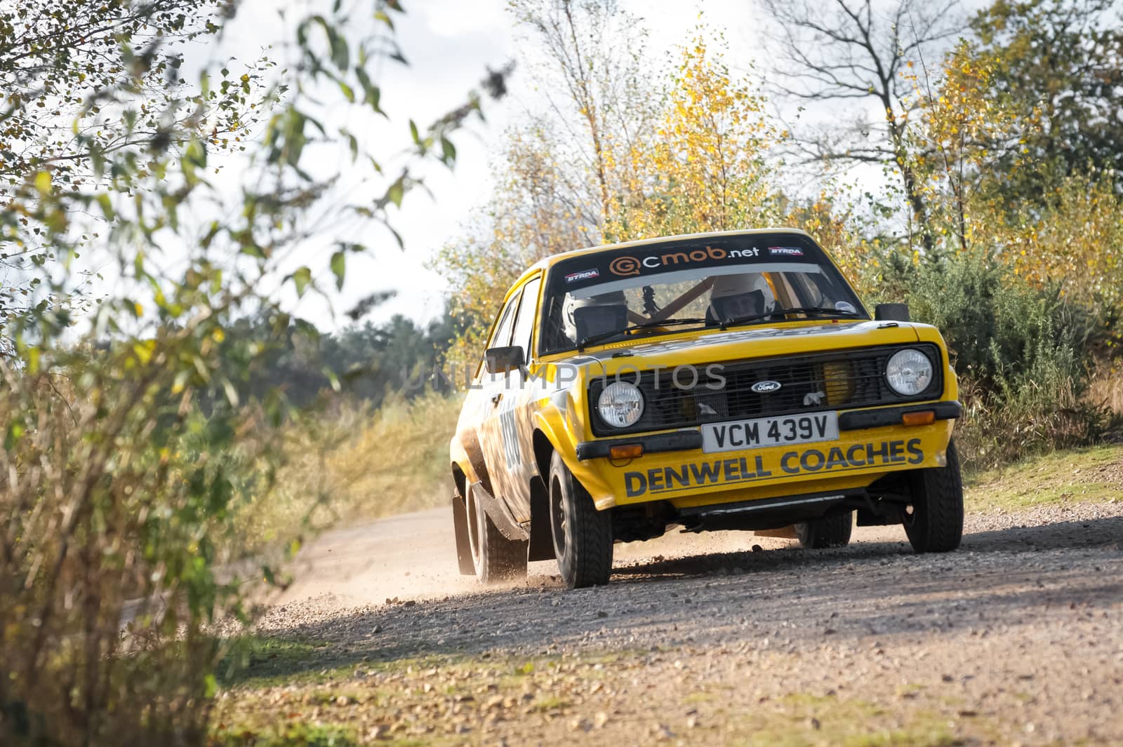 Aldershot, UK - November 3, 2012: Robert Dennis driving a Ford Escort Mk II on the Pavillion stage of the MSA Tempest Rally near Aldershot, UK