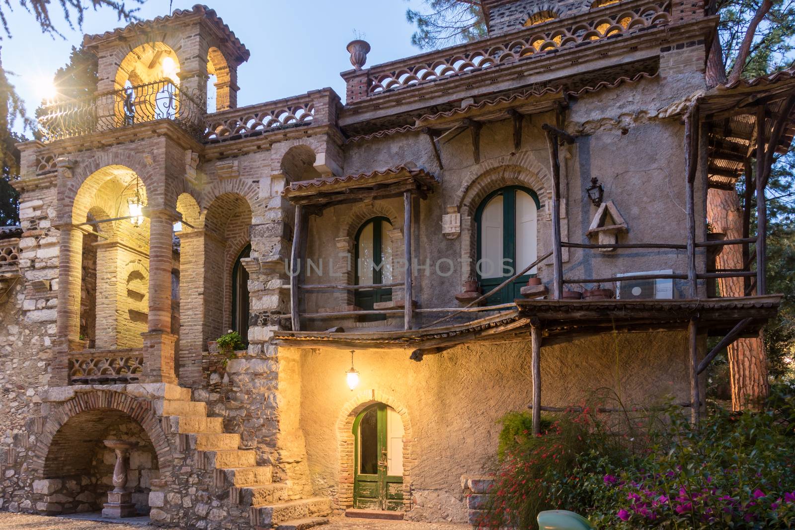 Old building in Taormina city garden