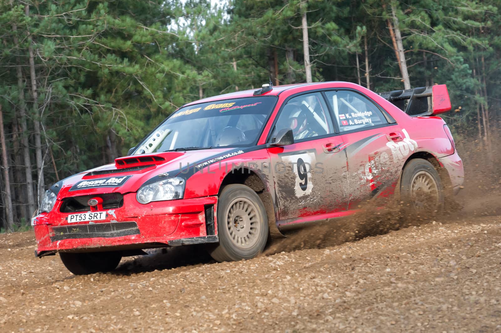 Bramshill Forest, UK - November 3, 2012: Kevin Rowledge sideways in a WRC spec Subaru Impreza on the Warren stage of the MSA Tempest Rally in Bramshill Forest, UK