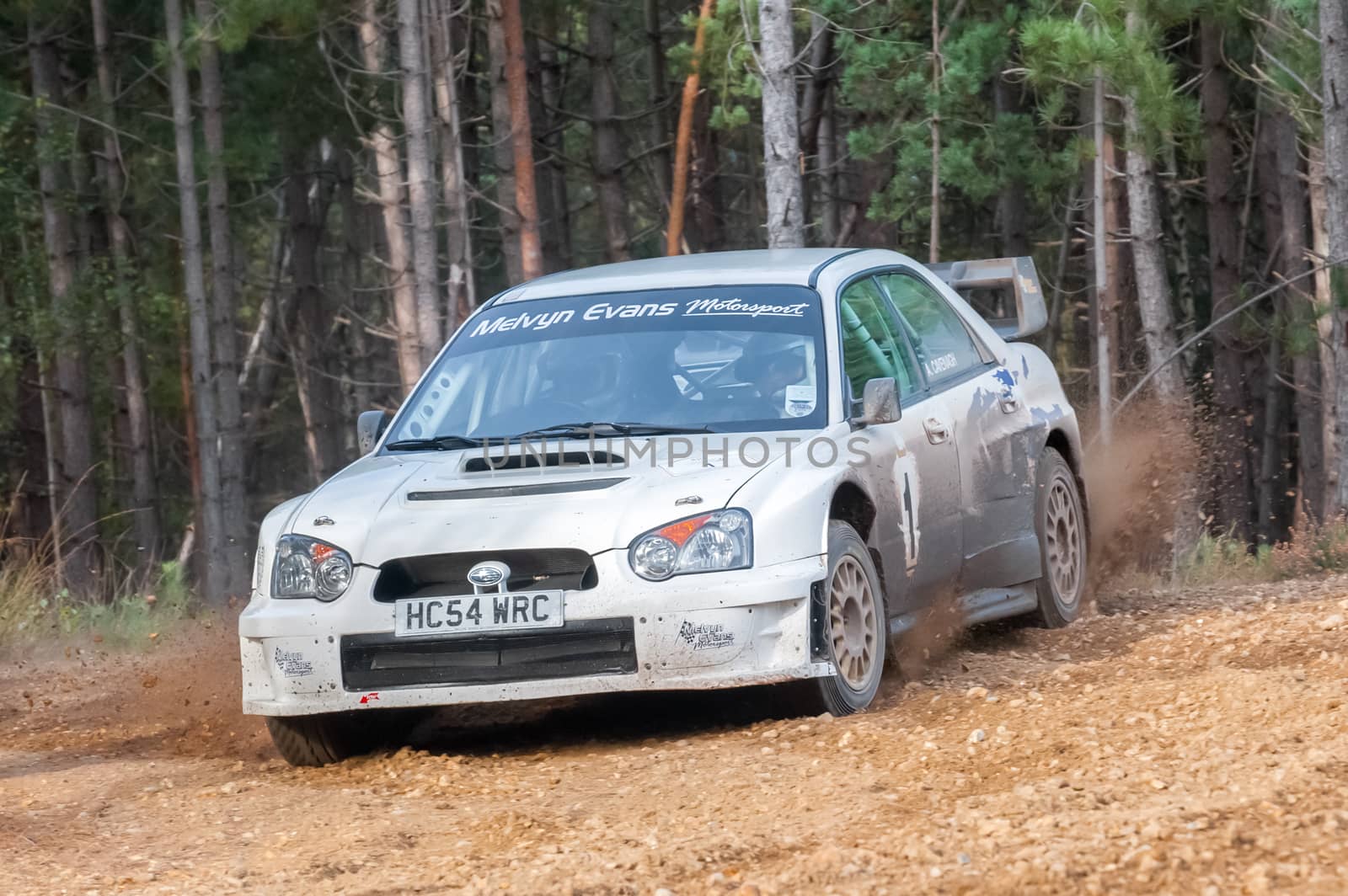 Bramshill Forest, UK - November 3, 2012: John Lloyd driving a WRC spec Subaru Impreza on the Warren stage of the MSA Tempest Rally in Bramshill Forest, UK