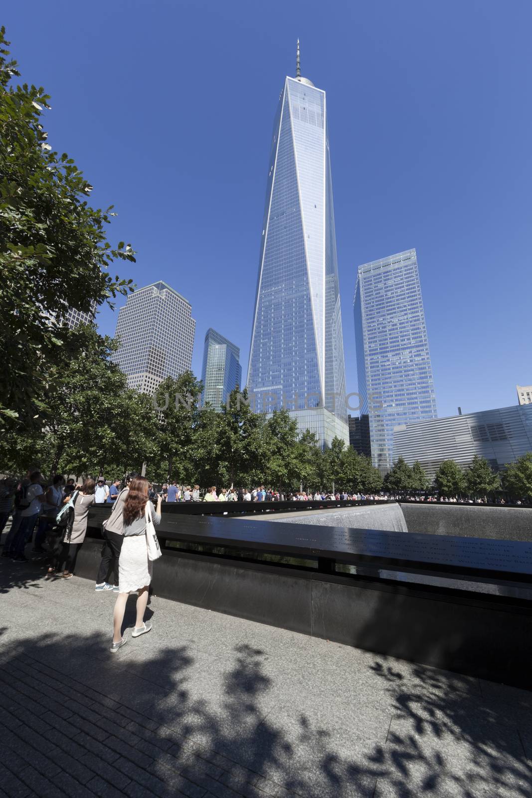 New York City, USA - September 27, 2014 : NYC's September 11 Memorial  in New York Downtown. The memorial was dedicated on the 10th anniversary of the Sept. 11, 2001 attacks.