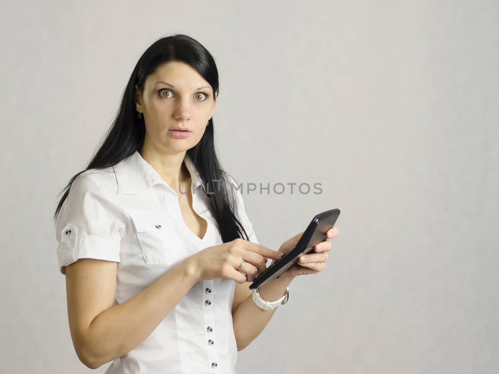 girl finds on the calculator. The result of the calculations her very upset. There is a place under the labels and advertising