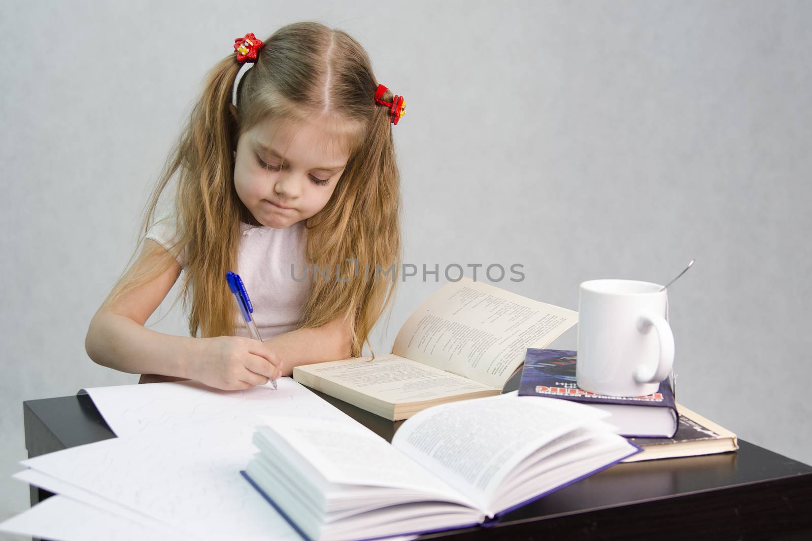 girl sits at a table and flips through the book and writes out the information you need. Next are still books, sheets of paper, a pen, a glass of tea. The image of a student, a pupil, a teacher and literary critic