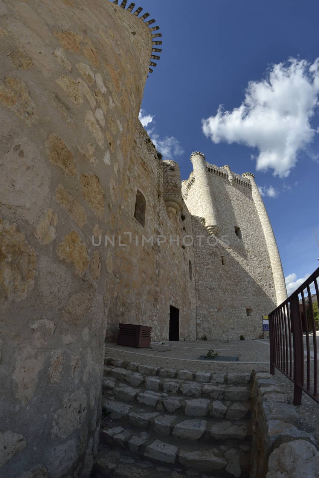 Torija castle through a fisheye lens. Spain. Sunny day with a few clouds in spring.