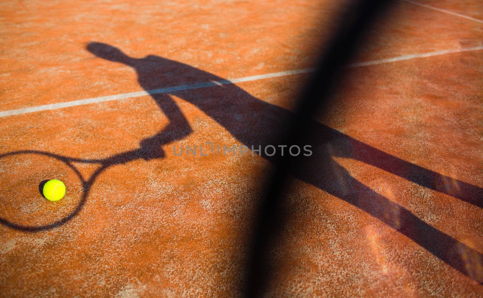 Shadow of a tennis player in action on a tennis court by viktor_cap