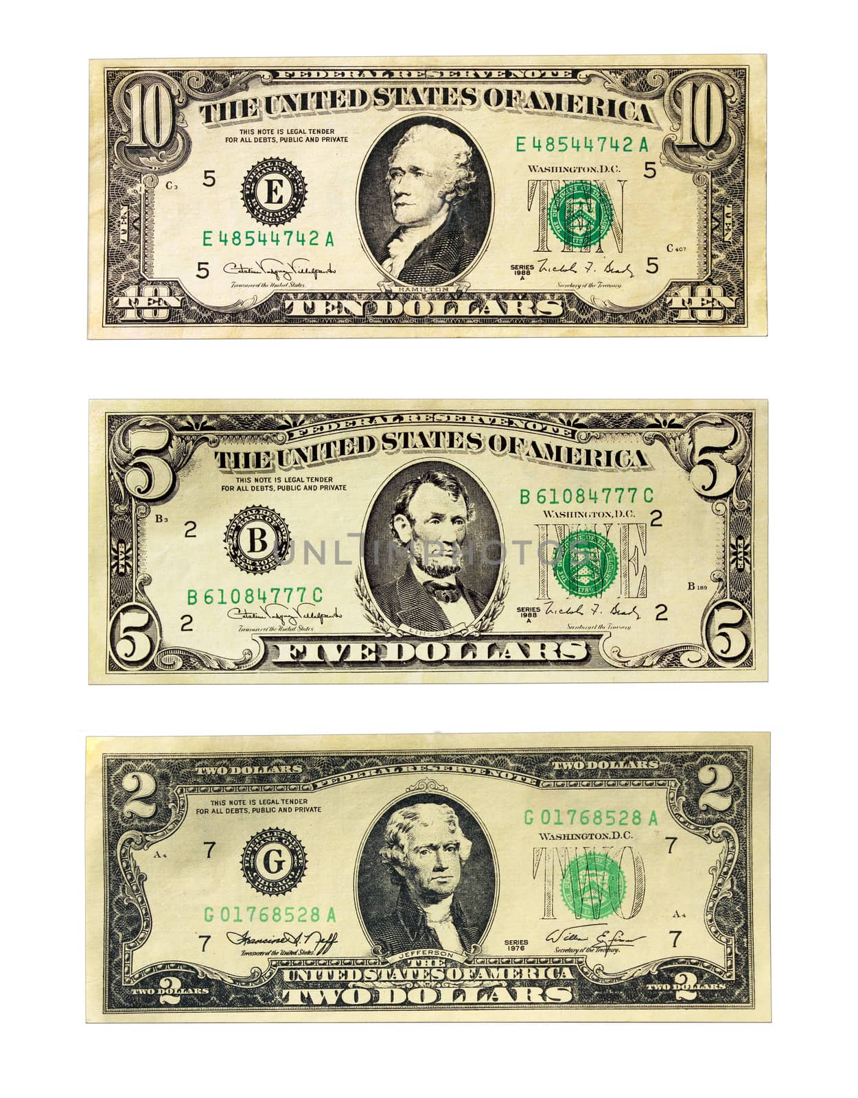 Banknotes of the American dollars face value 2, 5 and 10 dollars isolated on a white background