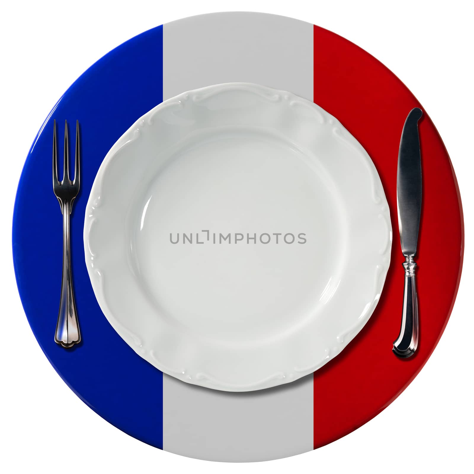 Concept of French cuisine with white plate and under plate colored with the colors of French flag and silver cutlery isolated on white background