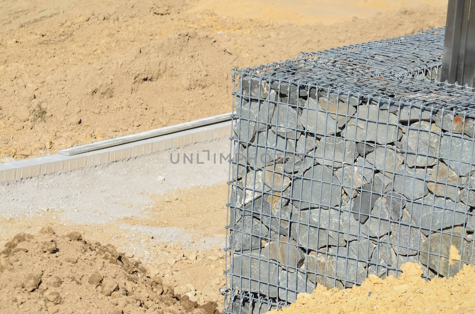 Gabion from the Italian Gabbione = large cage is also called gabion, bulk bin, wall stone basket or wire ballast box, it is a filled with stones wire basket.