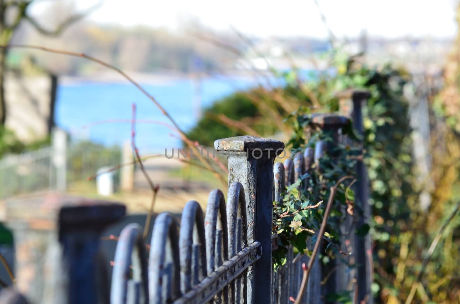 Old fence with blurred background by JFsPic