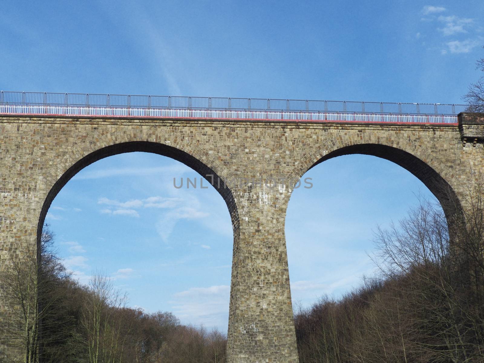 Stone arch bridge over a valley