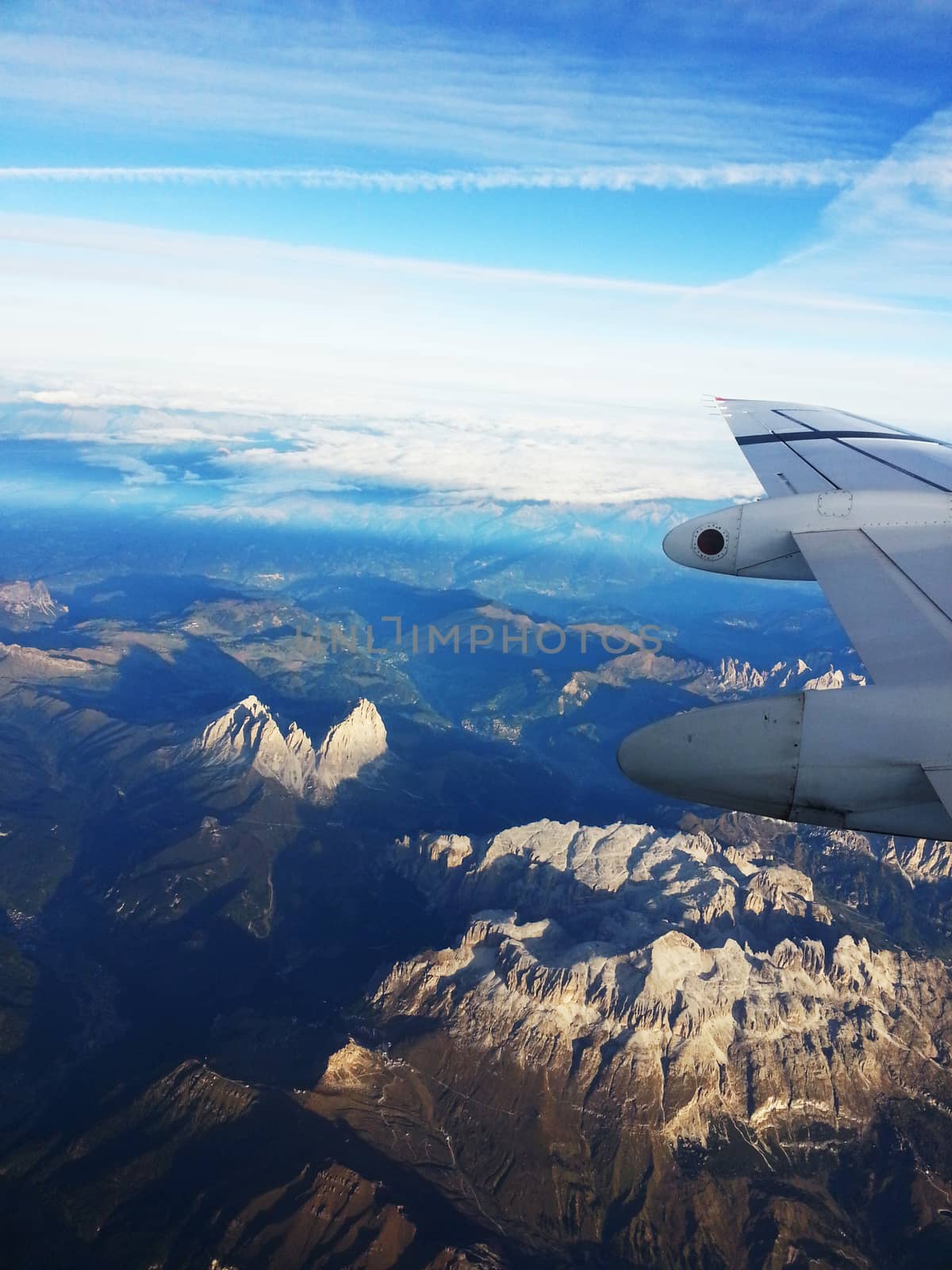 Alps mountain range view from airplane by prowpat