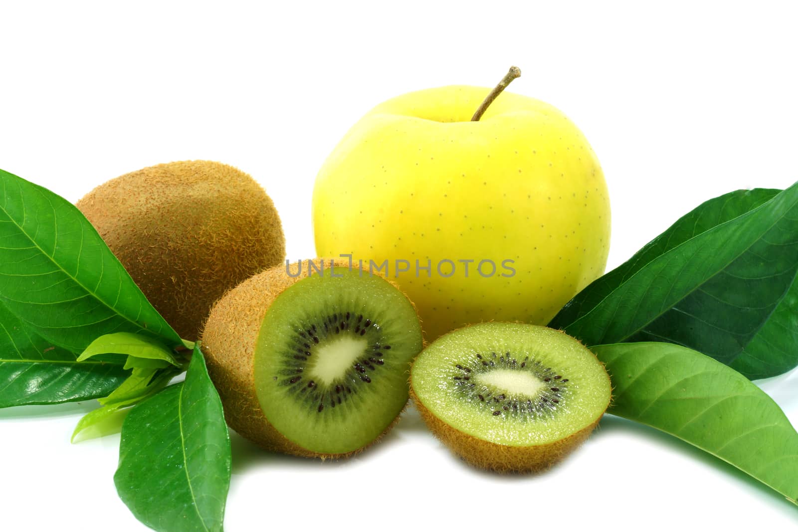 kiwi fruit and yellow apple isolated on white background