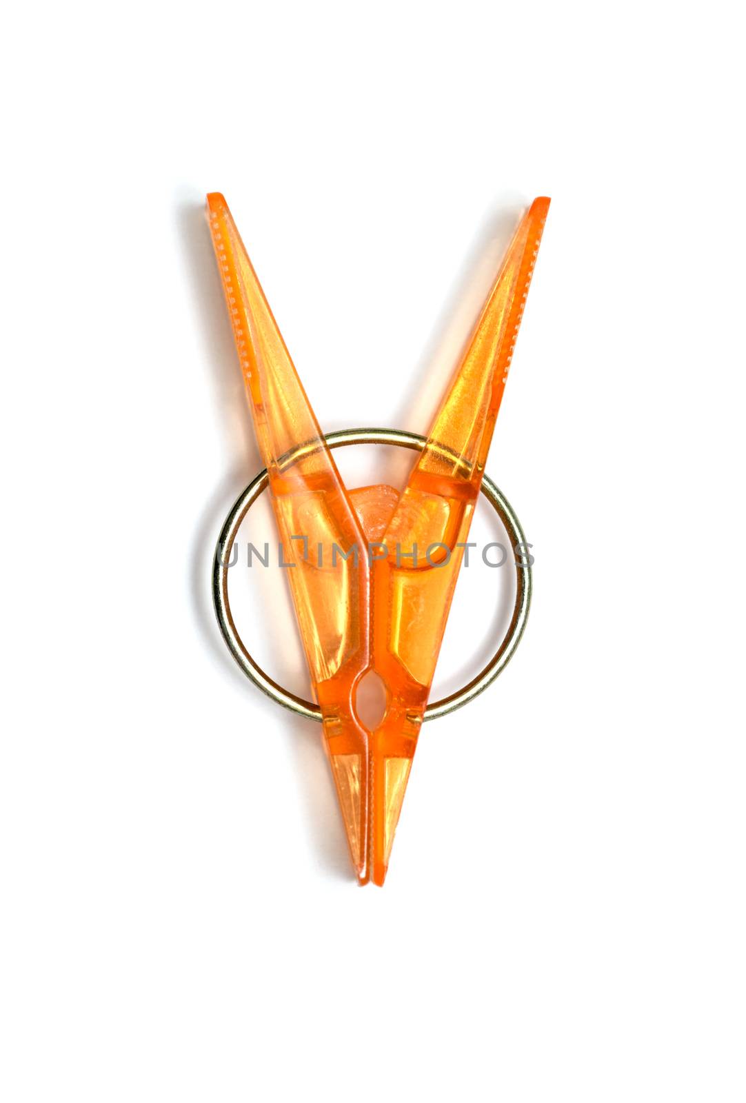 plastic clothespins with metal spring isolated on a white background