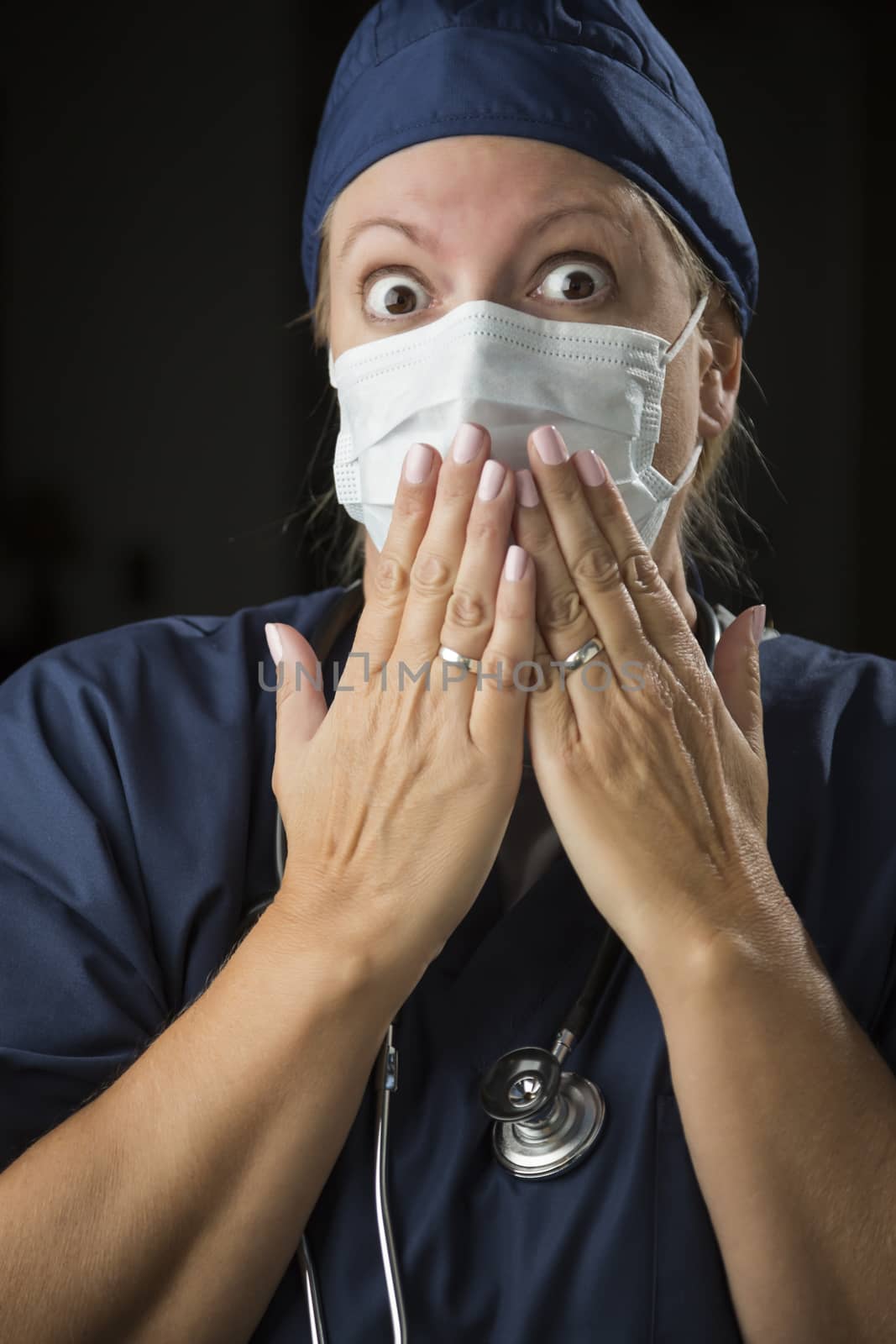 Shocked Female Doctor with Hands in Front of Mouth by Feverpitched