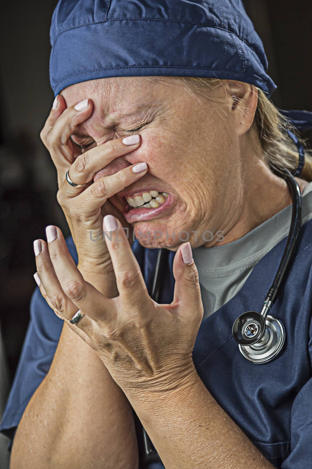 Agonizing Crying Female Doctor or Nurse by Feverpitched