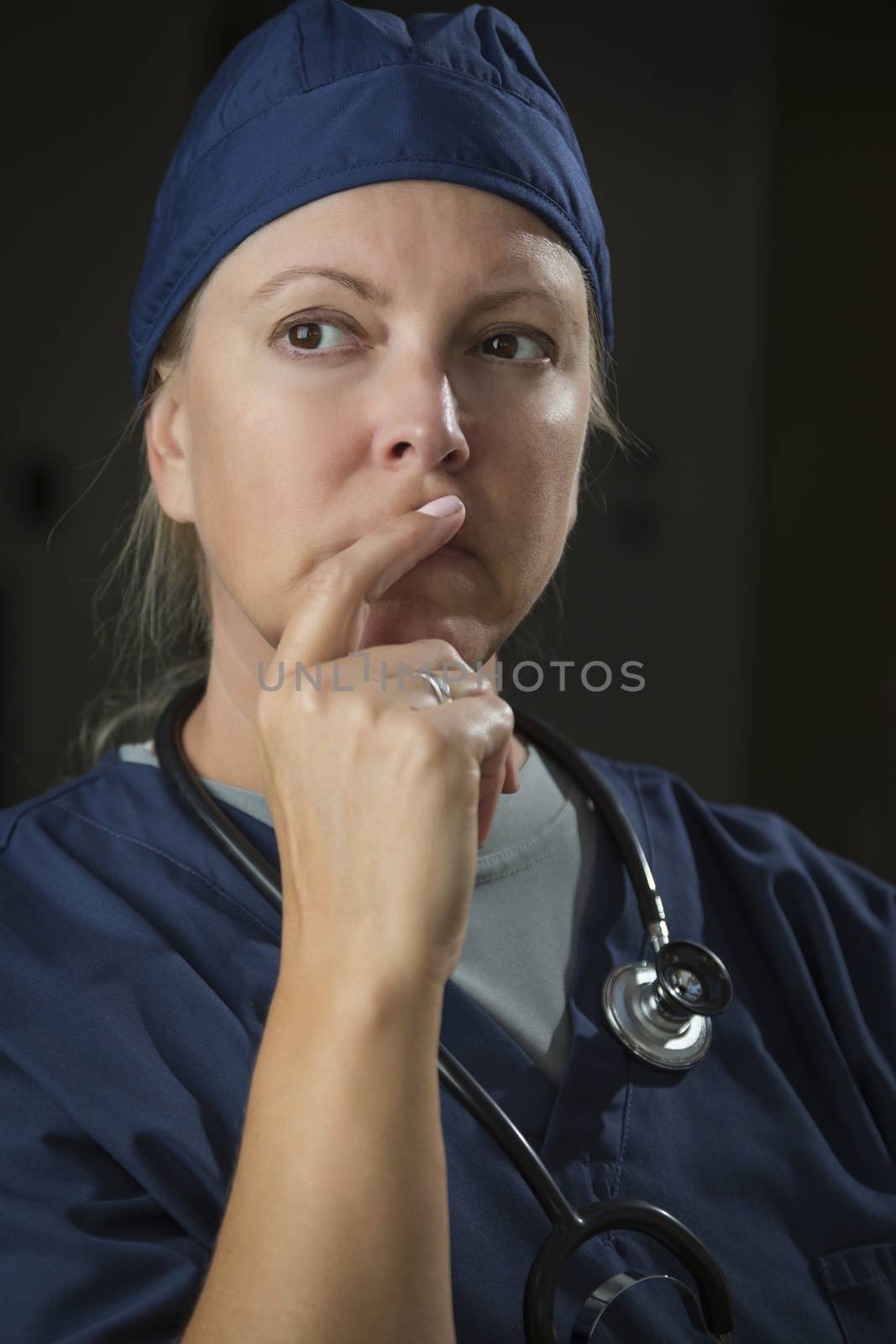 Attractive Female Doctor or Nurse Portrait by Feverpitched