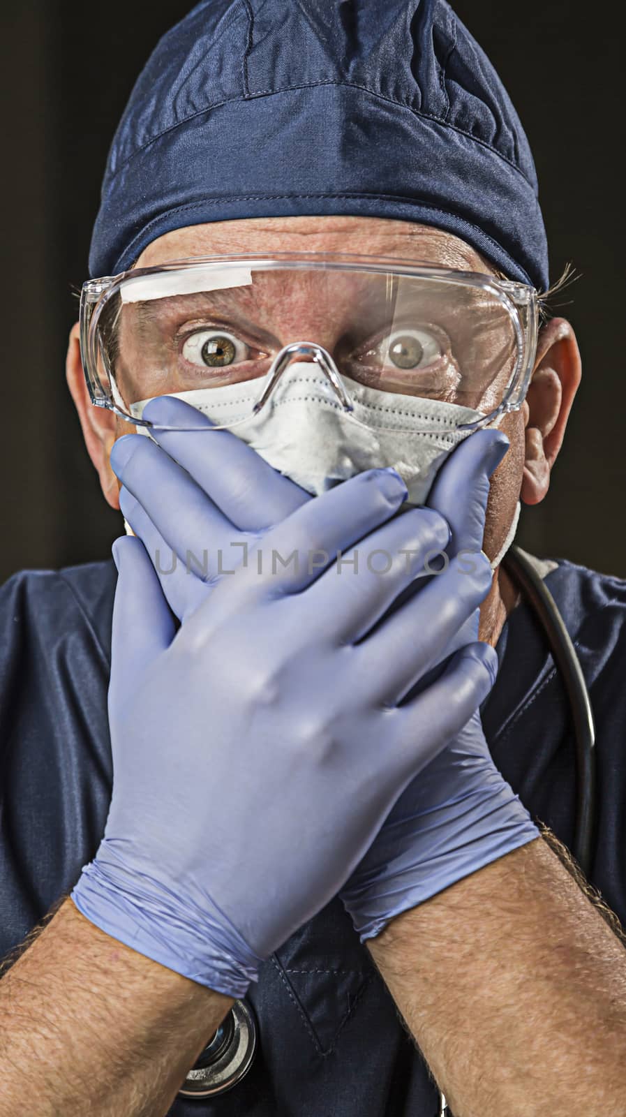 Stunned Doctor or Nurse with Protective Wear and Stethoscope by Feverpitched