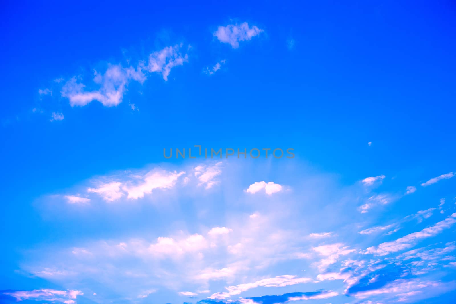 Clouds on evening sky colors.