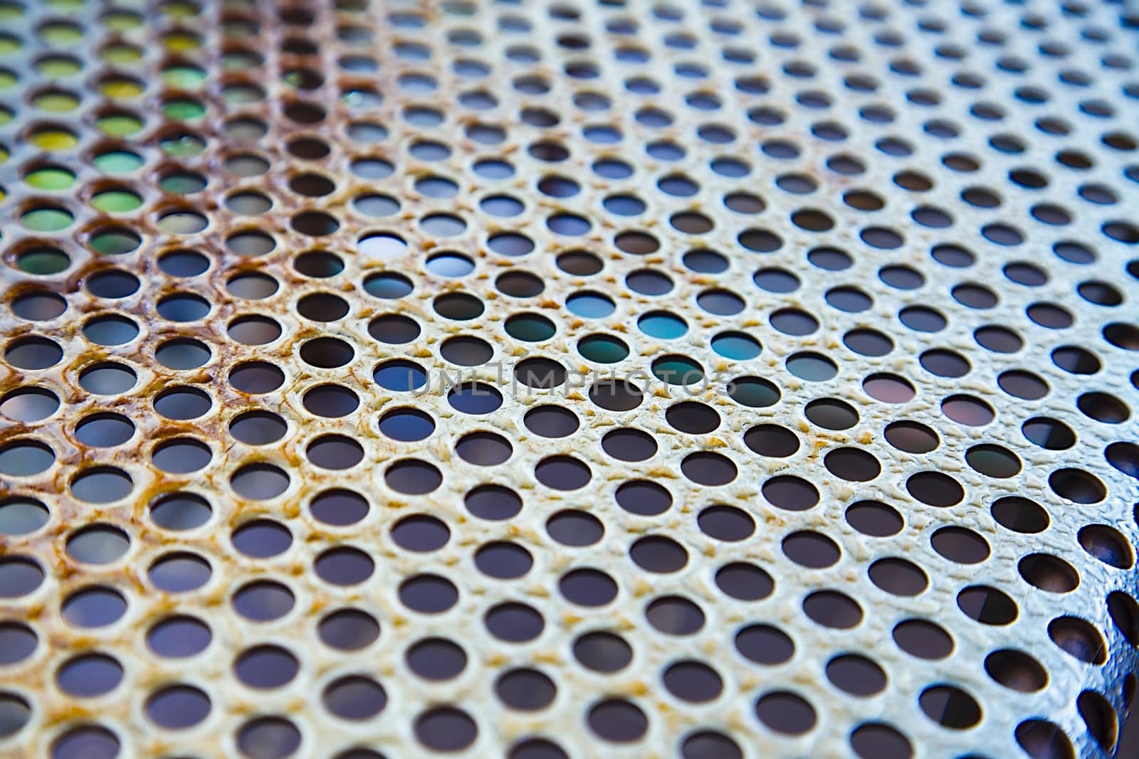 Rusty metal hole mesh pattern