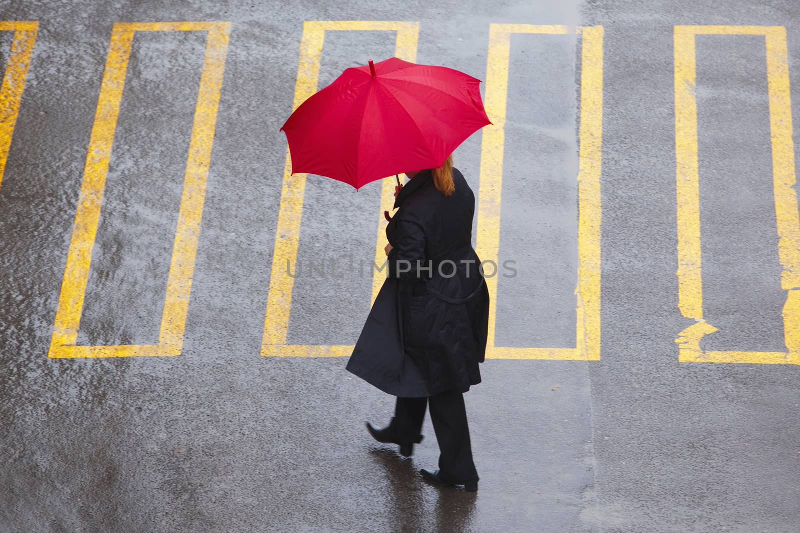 pedestrain with umbrella by courtyardpix