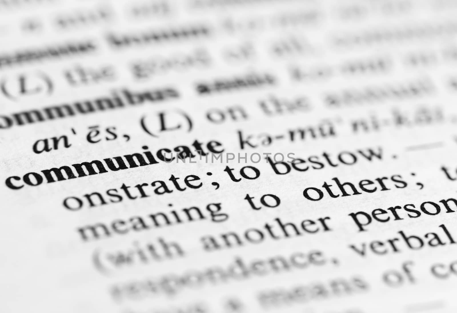 Close up of communicate definition by keneaster