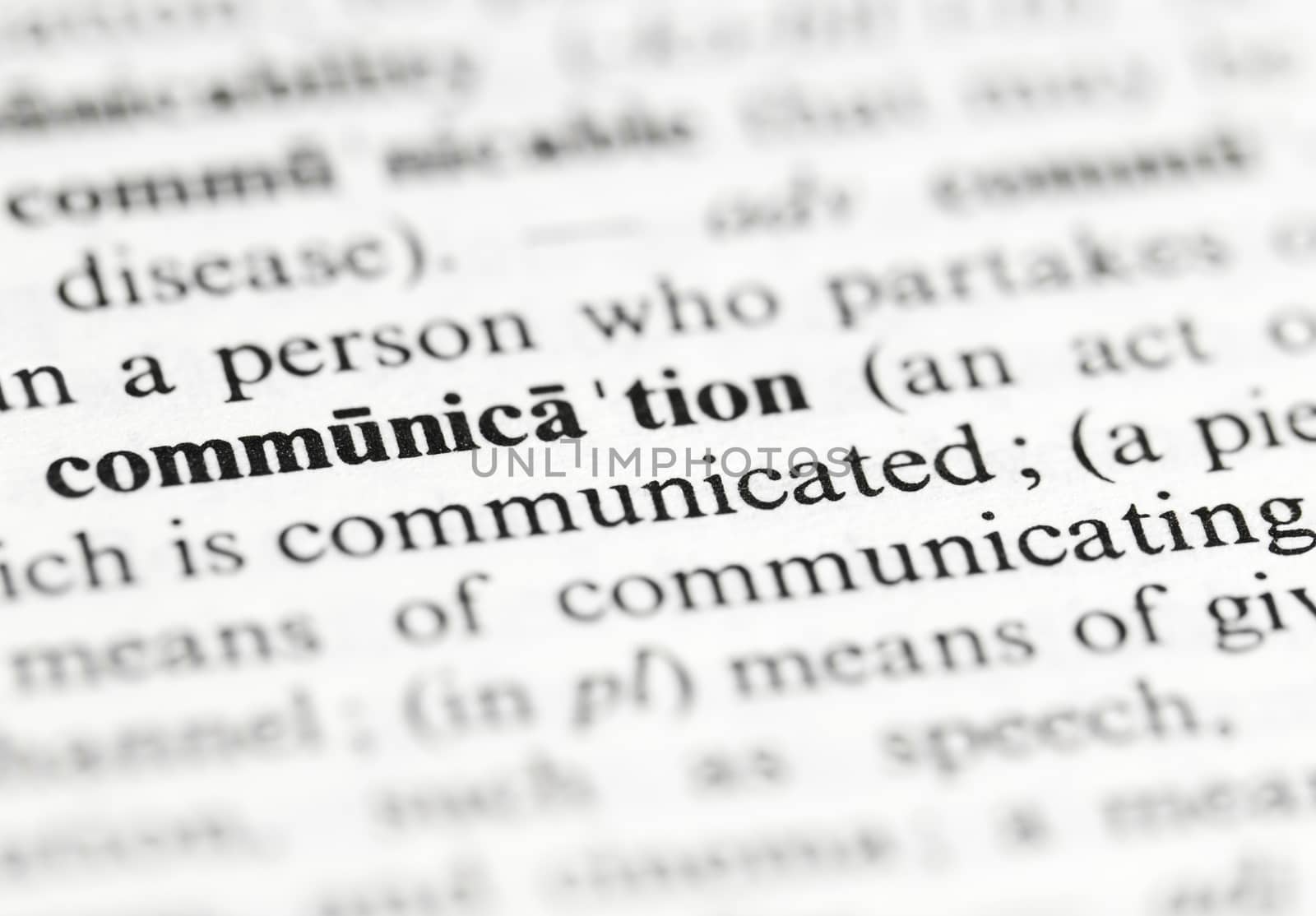 Close up of the word 'communication' and its definition in the dictionary