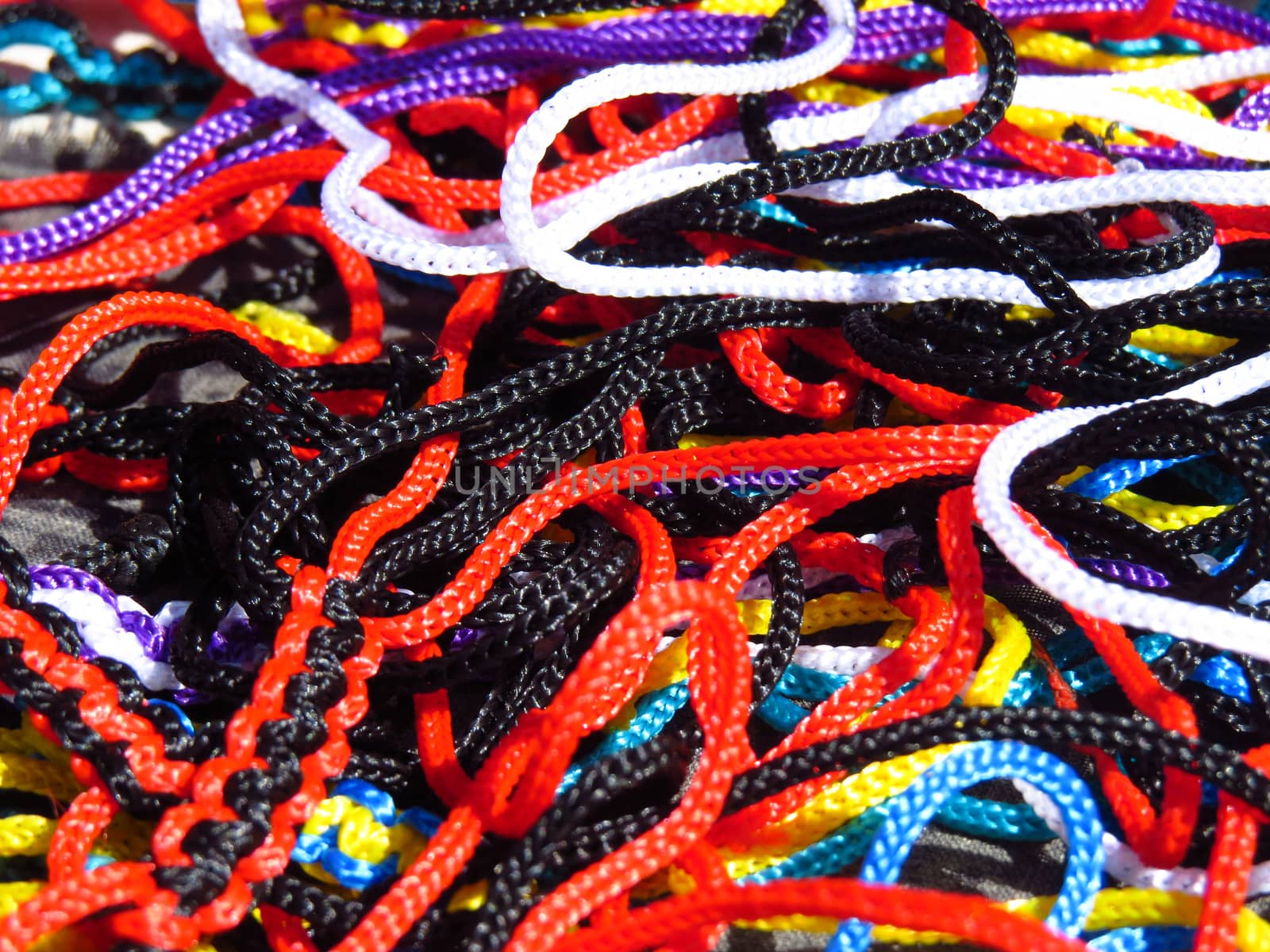 A background of colorful bright laces                               