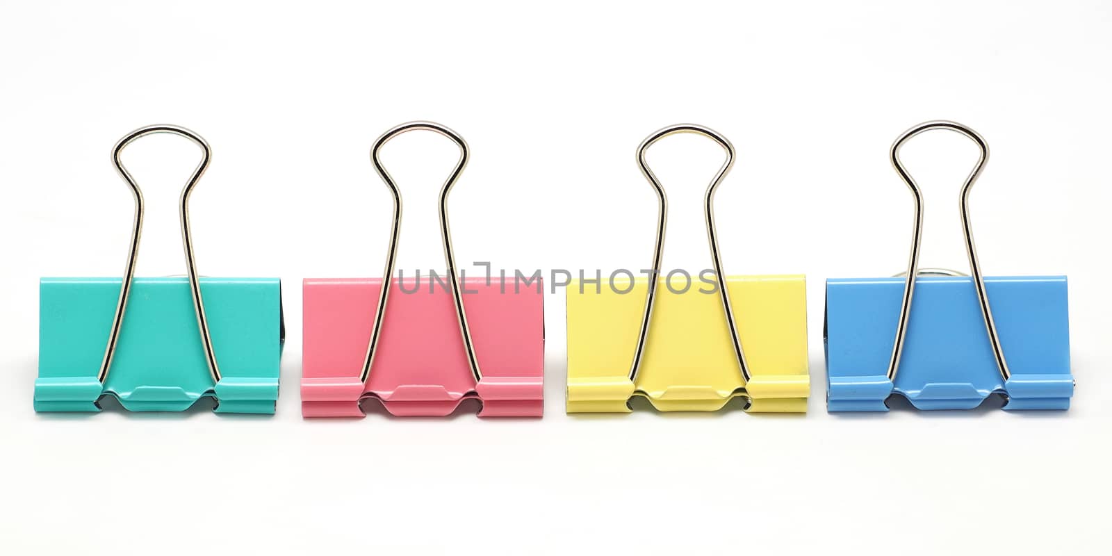 colorful  binder clip isolated on white background 
