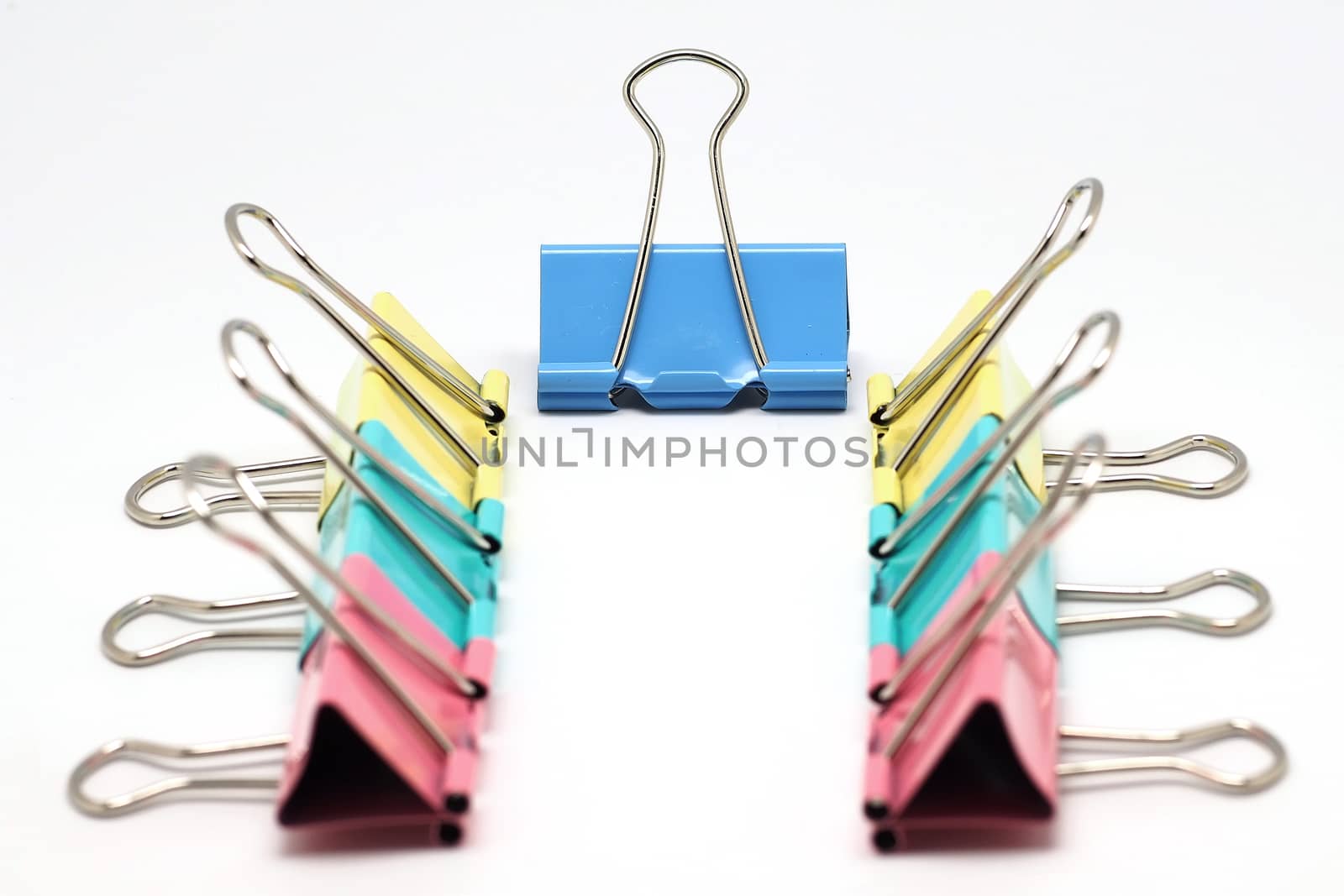 colorful  binder clip isolated on white background 