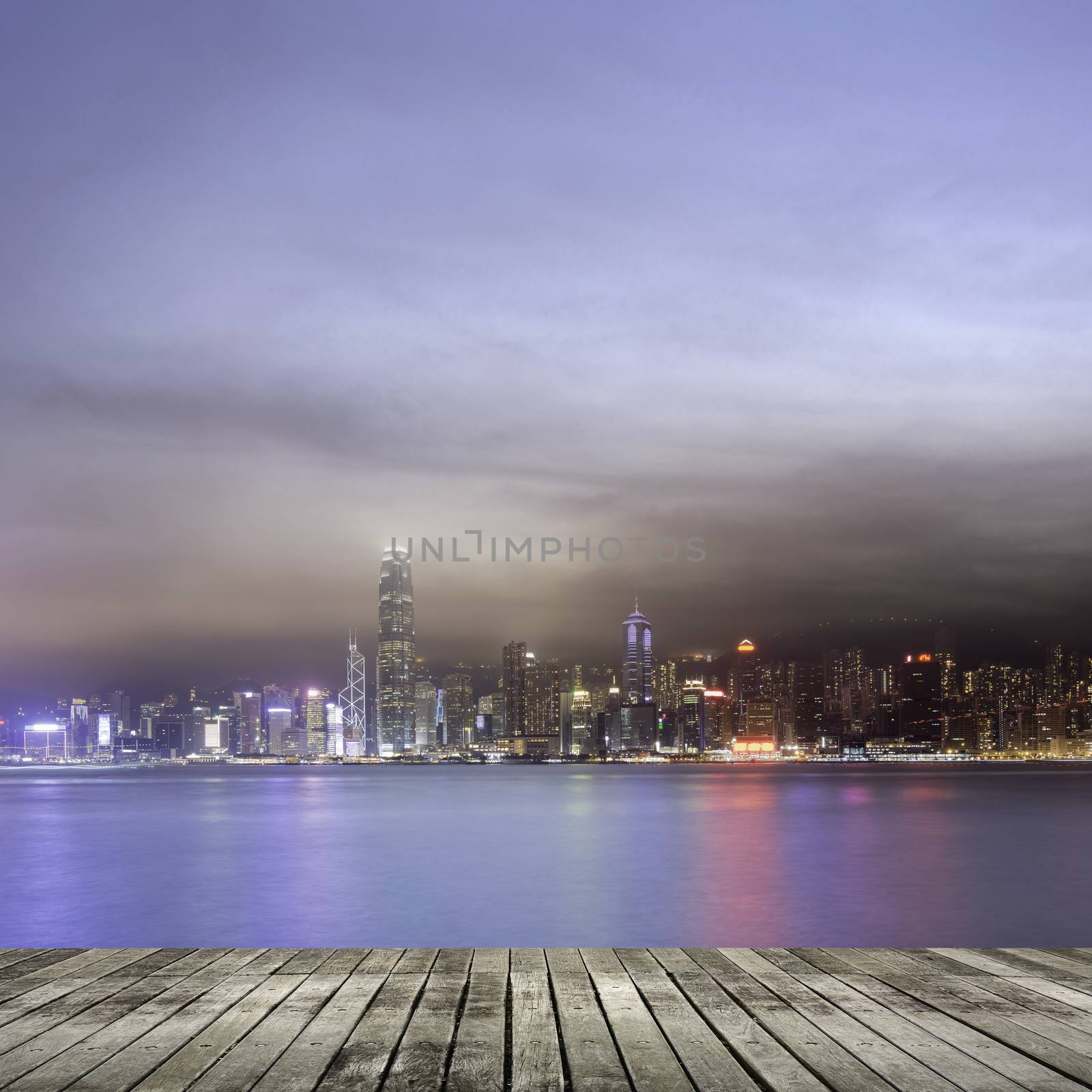 City night scenes of Victoria harbor in Hong Kong with copyspace on heaven.