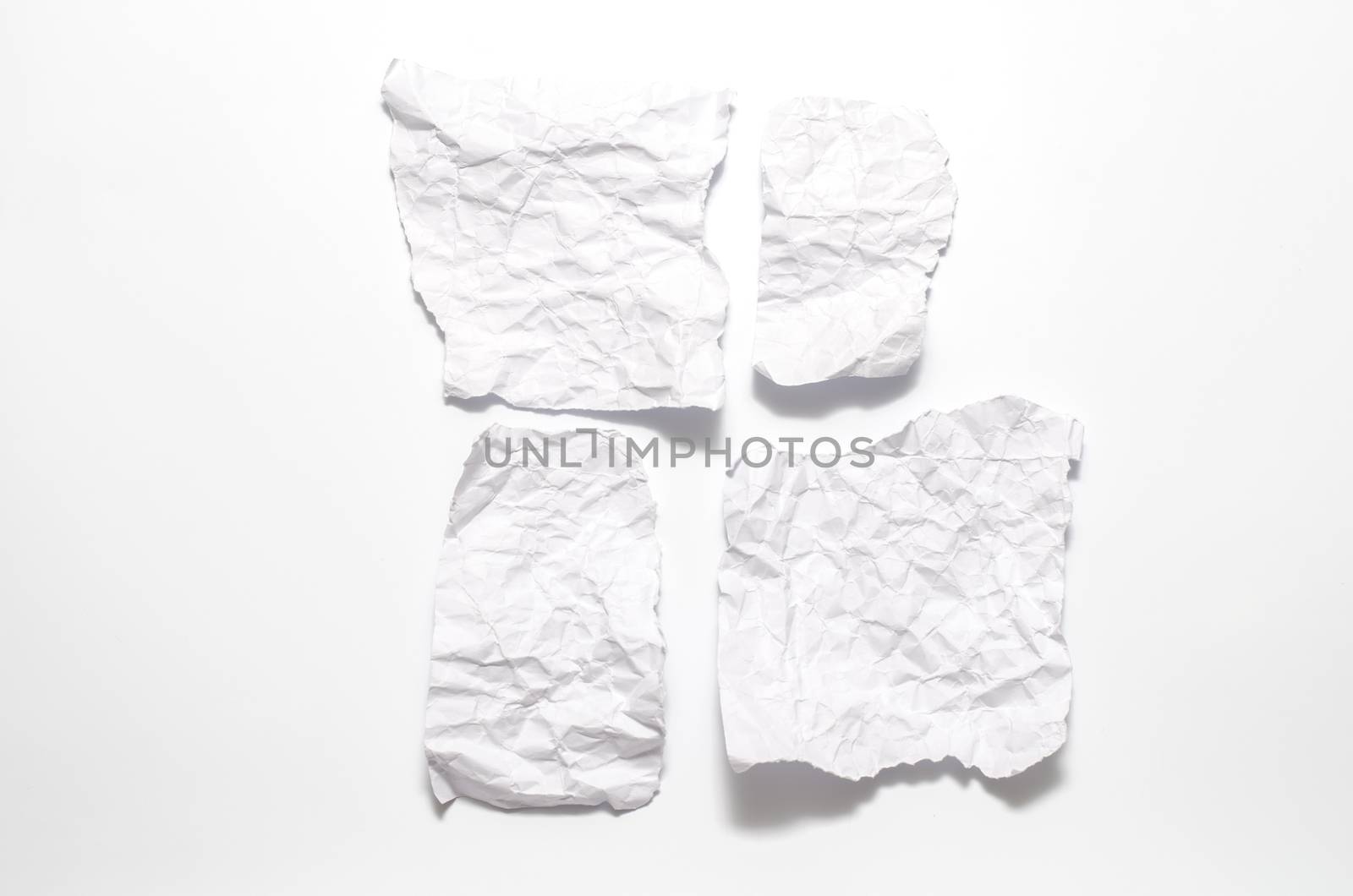 piece of white crumpled paper on a white background