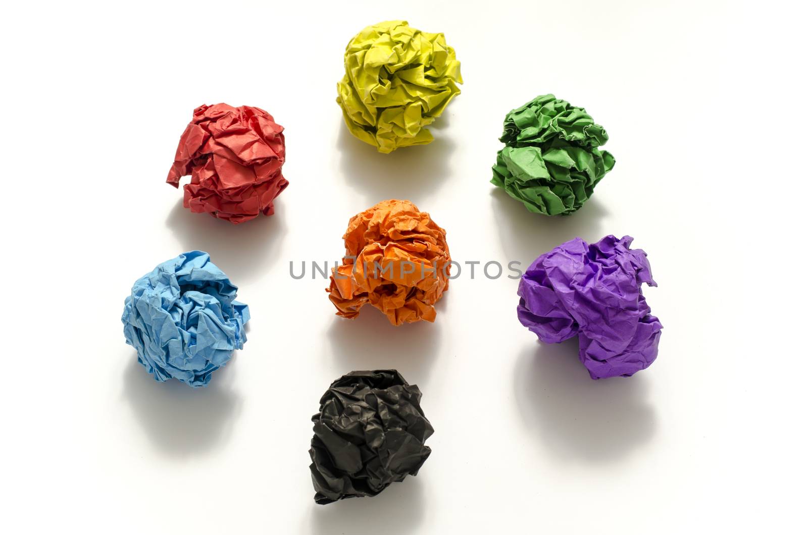 group of color crumpled paper ball on a white background